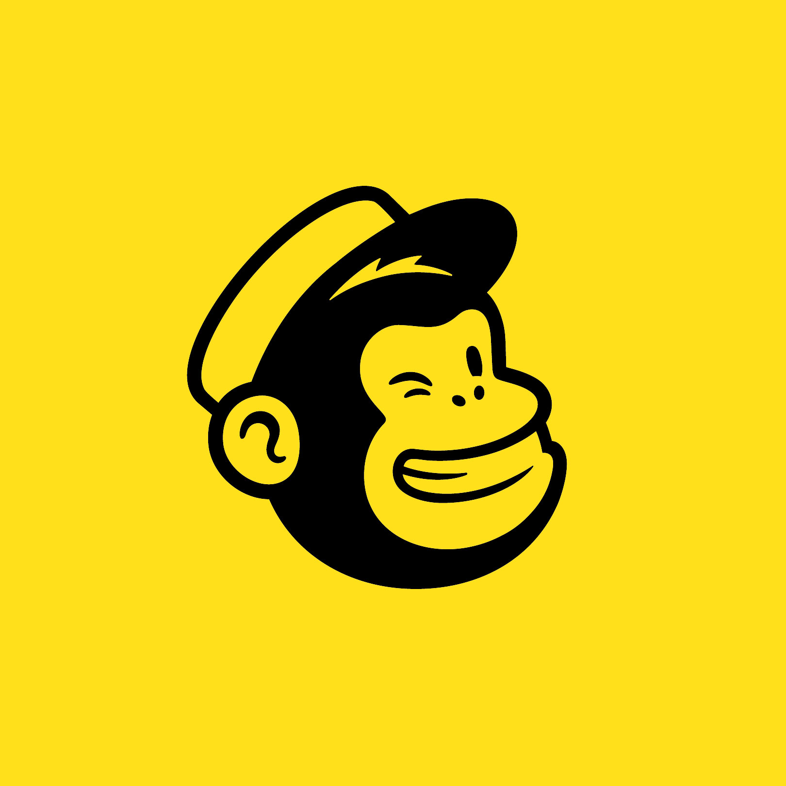 monkey winking in black on yellow background